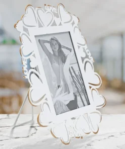 Cadre photo en métal blanc avec motifs cœur en verre doré