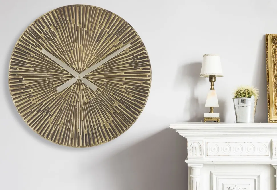 Horloge murale ronde métal bronzé