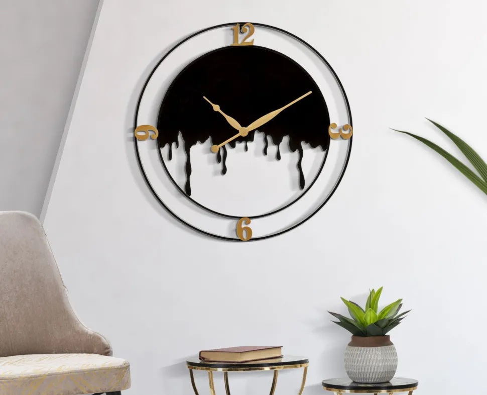 Horloge murale ronde Splash Fer Noir et finitions dorées