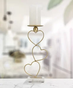 Porte-bougie cœurs en métal doré et base en marbre blanc