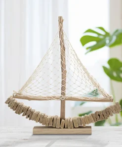 Sculpture voilier en bois voile tissu base bois massif