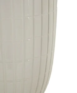 Vase en céramique blanche avec anneaux dorés