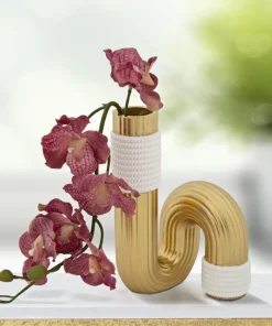 Vase sinueux blanc et doré en polyester